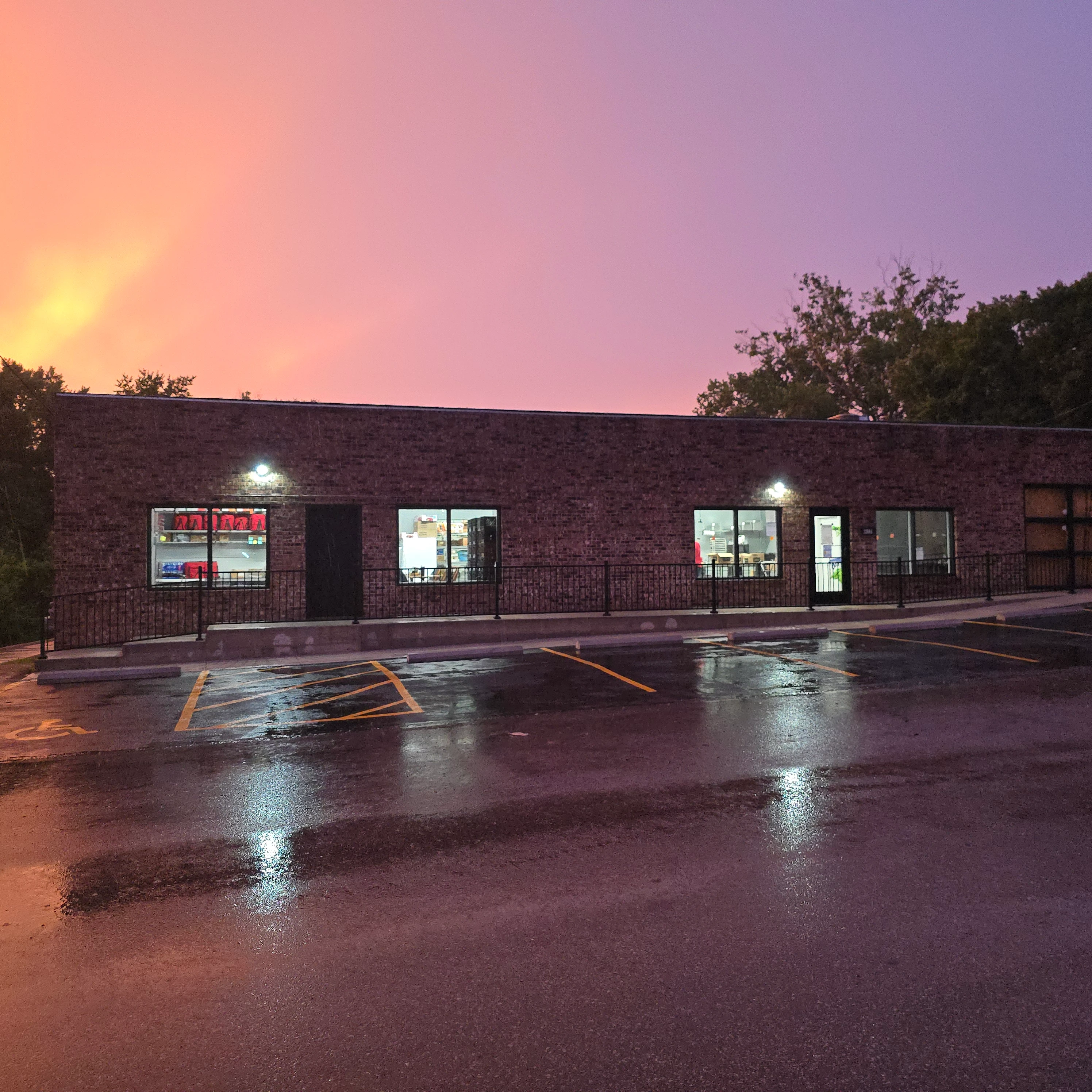 Storefront during a break in the storm before dawn